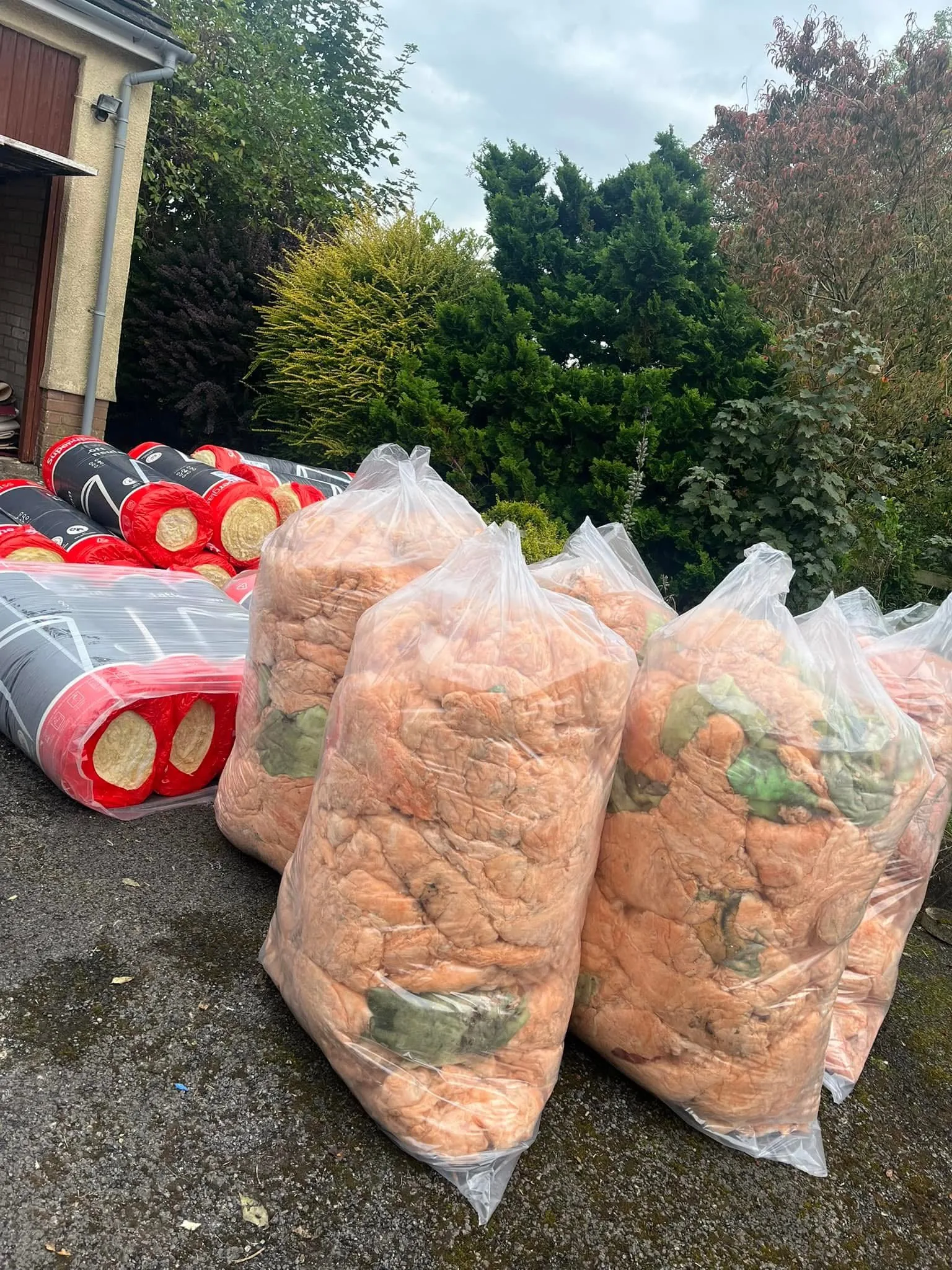 Bagged old insulation ready for disposal