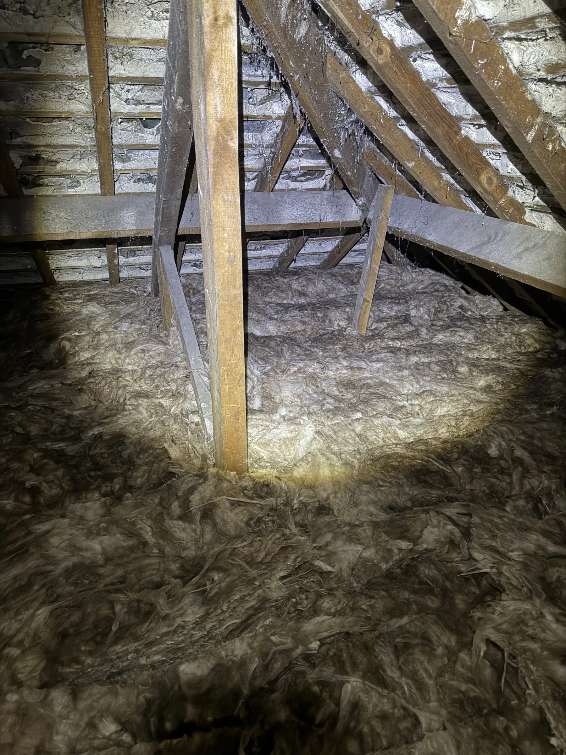 Loft insulation specialist at work in Cumbria