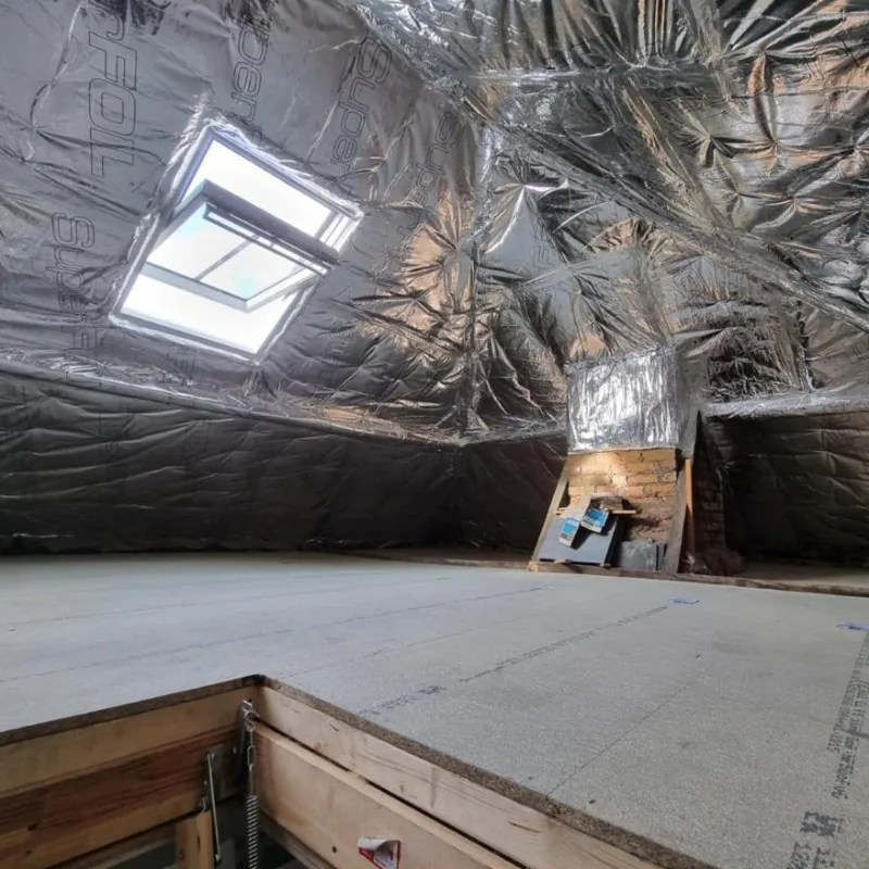 Superfoil insulation under a pitched roof with skylight